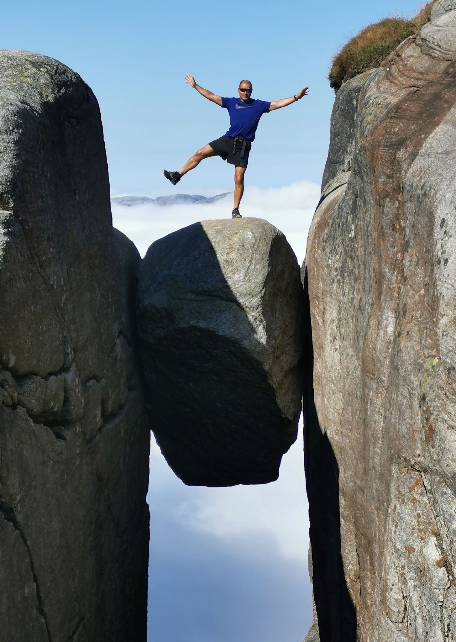 Crazy norwegian on top of kjeragbolten norway